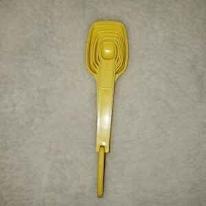 Vintage Tupperware Yellow Measuring Spoon Set